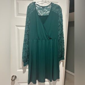 Emerald green dress with lace sleeves